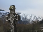 SX02633 Celtic cross in Glendalough with view to Lugduff mountain.jpg